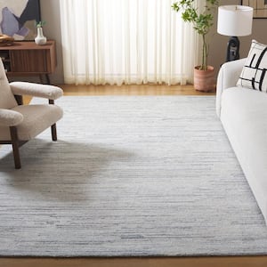 Abstract Beige/Blue 8 ft. x 10 ft. Linear Marle Area Rug