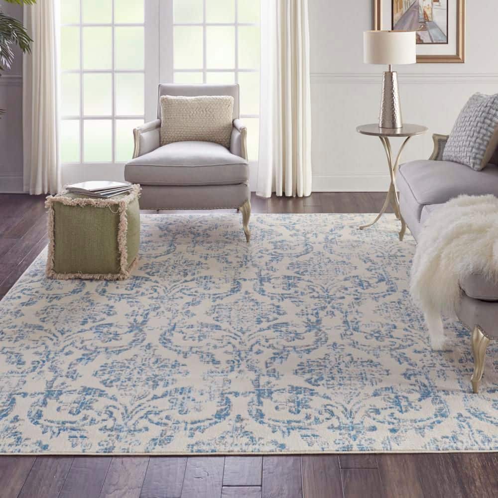 Elegant Ivory and Blue Damask 7' x 10' Synthetic Area Rug