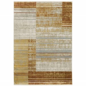 4' X 6' Rust Gold Blue Grey Ivory And Tan Geometric Power Loom Stain Resistant Area Rug With Fringe