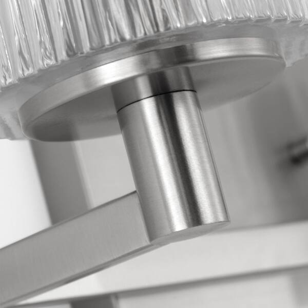 Generation Lighting - Lando 14.25 in. W x 7.75 in. H 2-Light Brushed Steel Bathroom Vanity Light with Clear Fluted Glass Shades