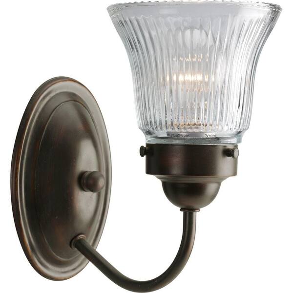 Progress Lighting Fluted Glass Collection 1-Light Antique Bronze Clear Prismatic Glass Traditional Bath Vanity Light
