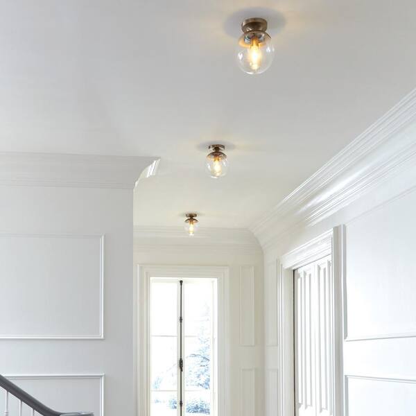 Generation Lighting - Leo 8 in. 1-Light Satin Brass with Clear Seeded Glass Shade Flush Mount