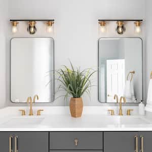 Clytaemnestric Modern 21.6 in. 3-Light Matte Black and Satin Gold Vanity Light with Cylinder Clear Glass Shades