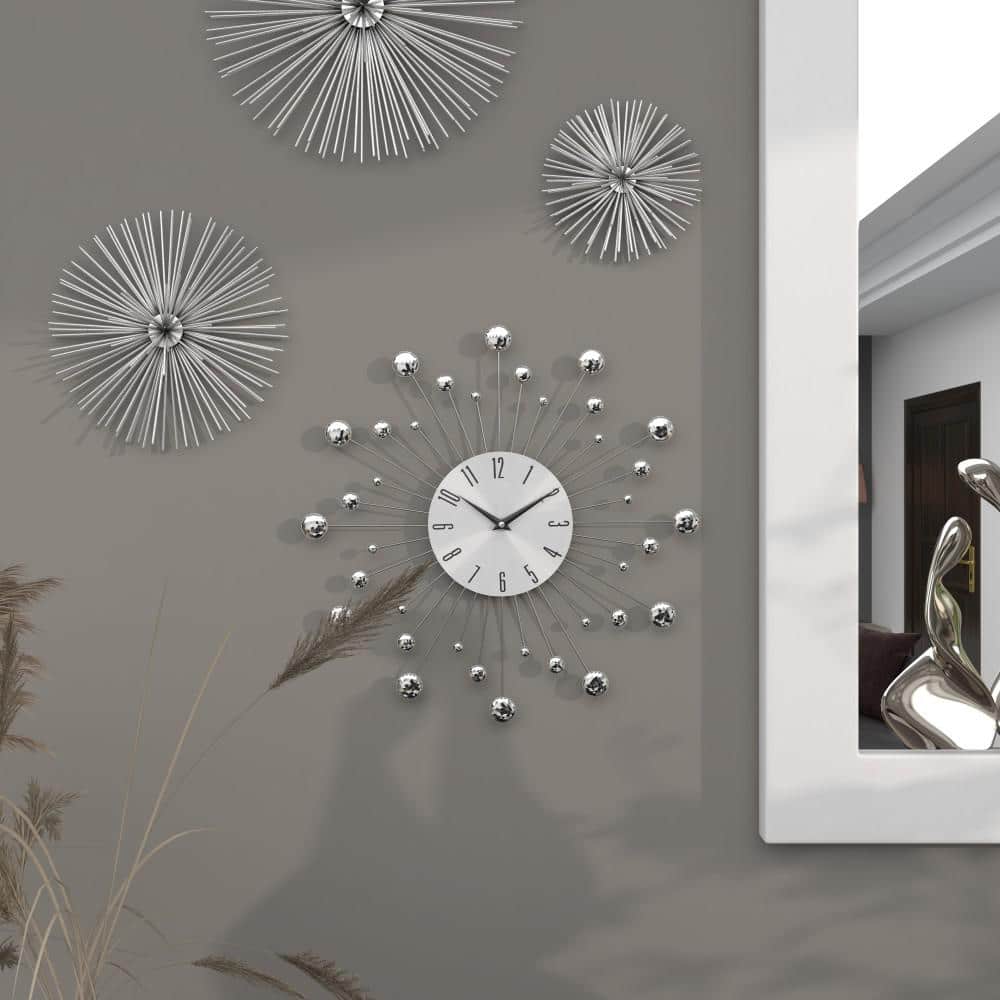 Silver Metal Starburst Wall Clock with Crystal Accents