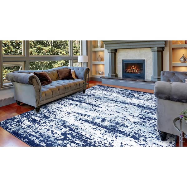 https://images.thdstatic.com/productImages/0d4dc016-655f-4ce0-85d6-a3b3e3731cbd/svn/navy-concord-global-trading-area-rugs-69555-1f_600.jpg