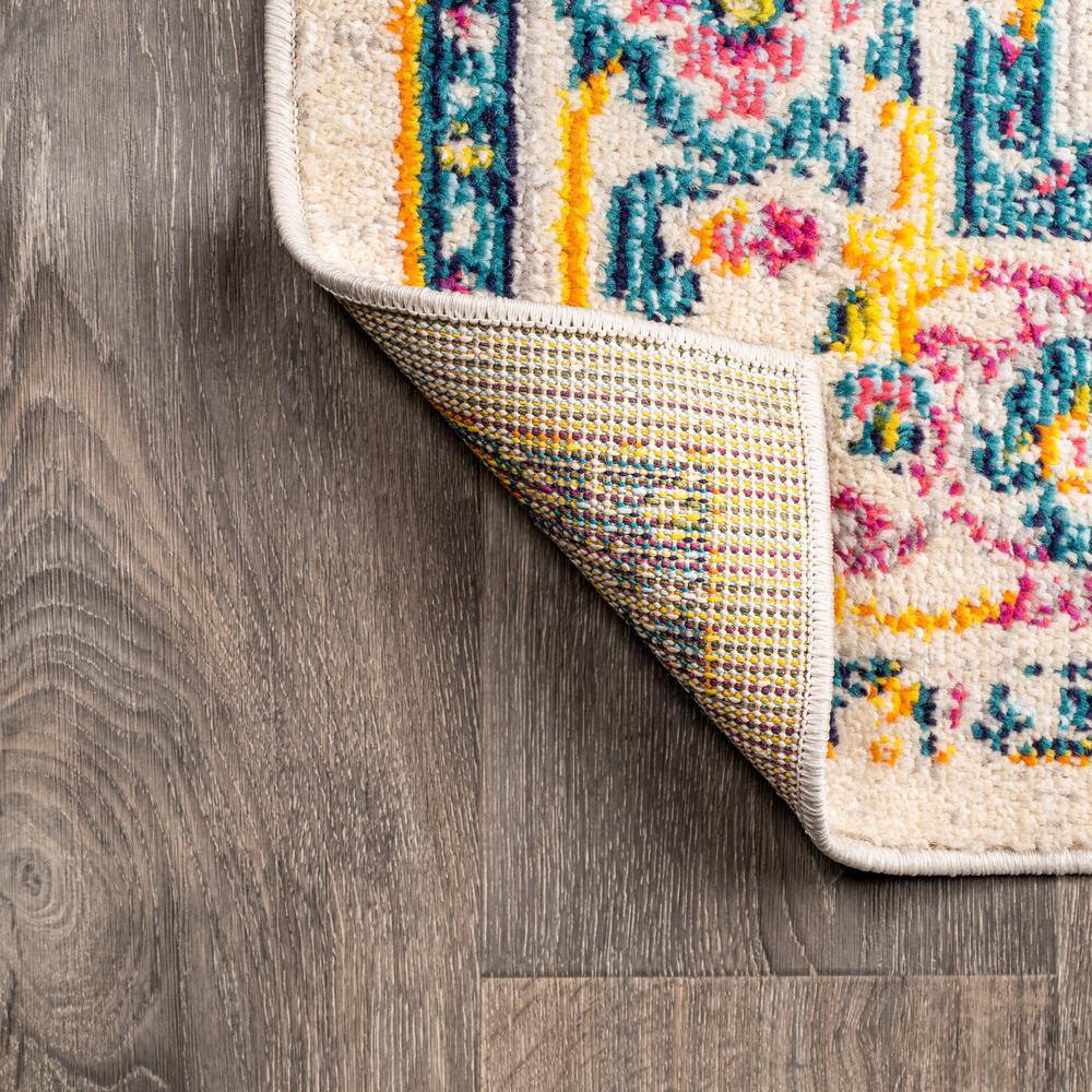 Ivory and Beige Reversible Medallion Synthetic Area Rug