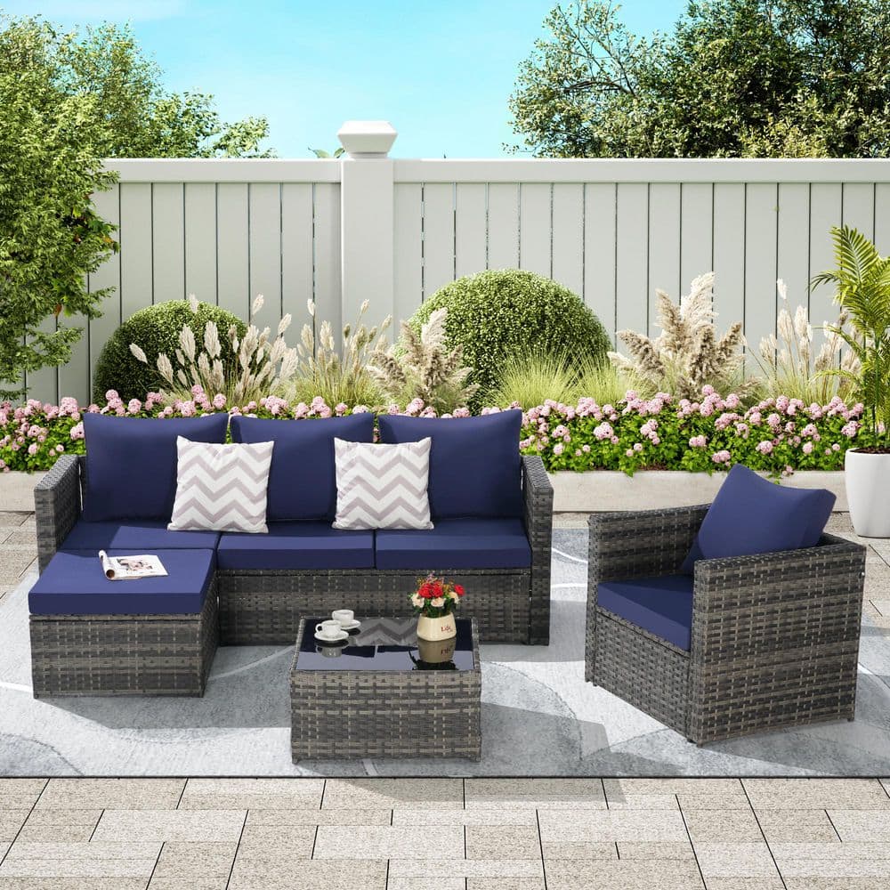3-Piece Wicker Outdoor Sectional Set with Dark Blue Cushions and Coffee Tab