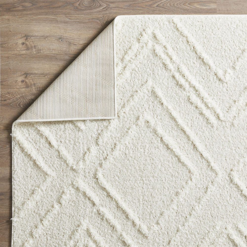 Cream 9' x 12' Stain-Resistant Synthetic Area Rug