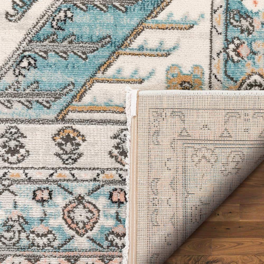 Indira Blue and Ivory Rectangular Synthetic Area Rug 4' x 6'