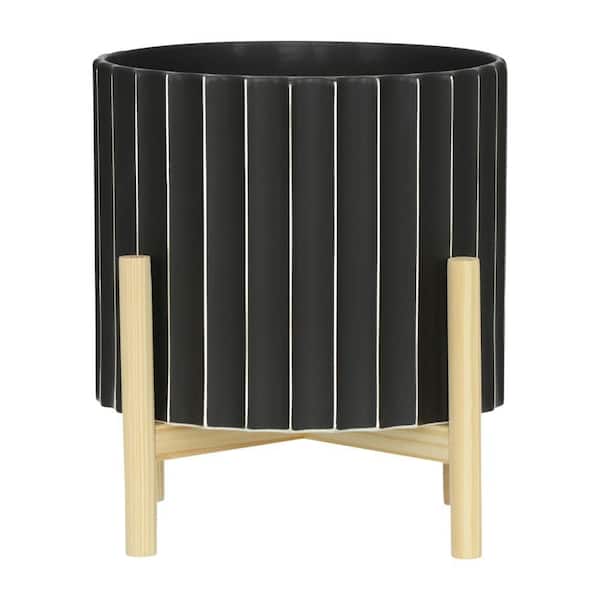 Black Ceramic Fluted Planter (10 in. W x 11 in. H) with Wood Stand