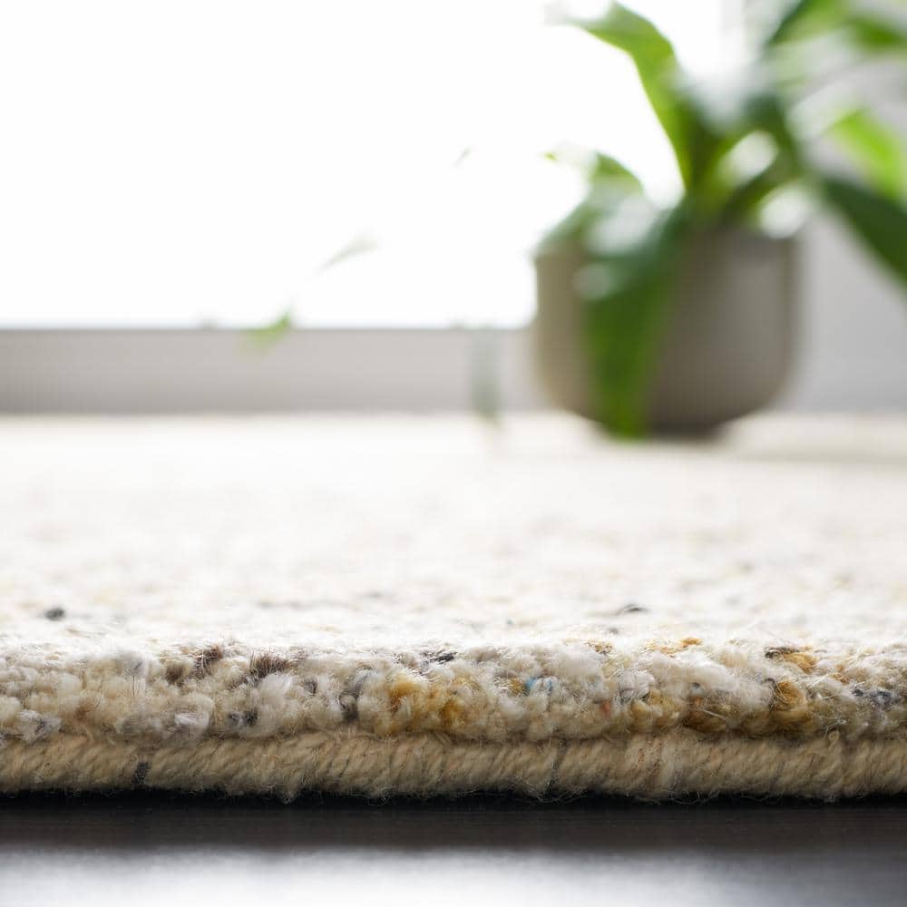 Beige and Gold Abstract Tufted Wool 8' x 10' Area Rug