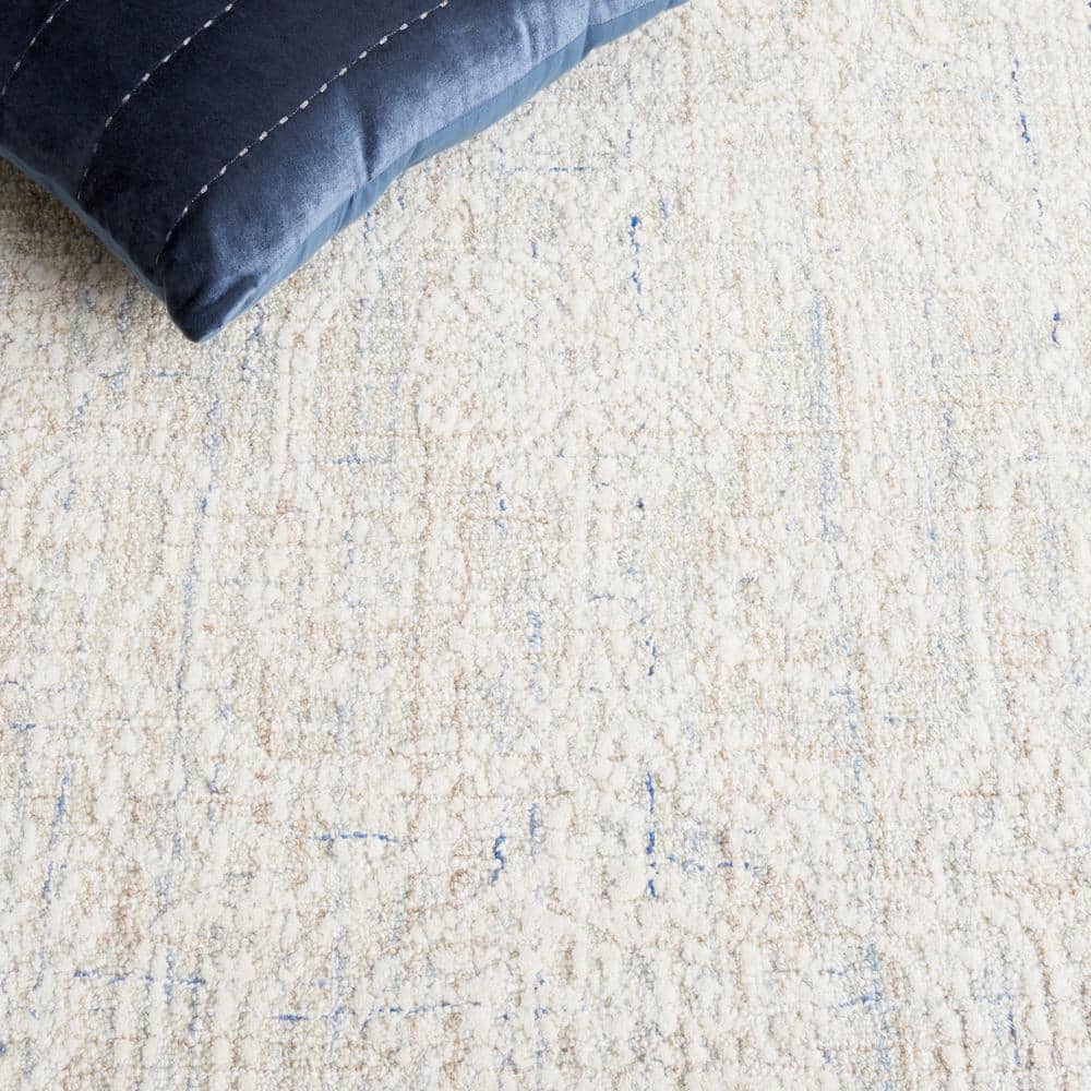 Handmade Blue and Ivory Wool Tufted 8' x 10' Rug