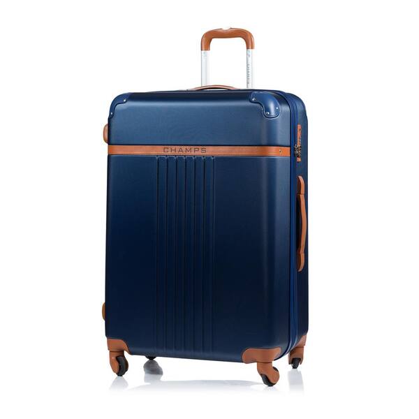 navy and brown luggage