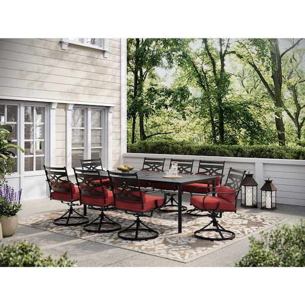 Hanover Montclair 9-Piece Steel Outdoor Dining Set with Chili Red Cushions, 8 Swivel Rockers and 42 in. x 84 in. Table