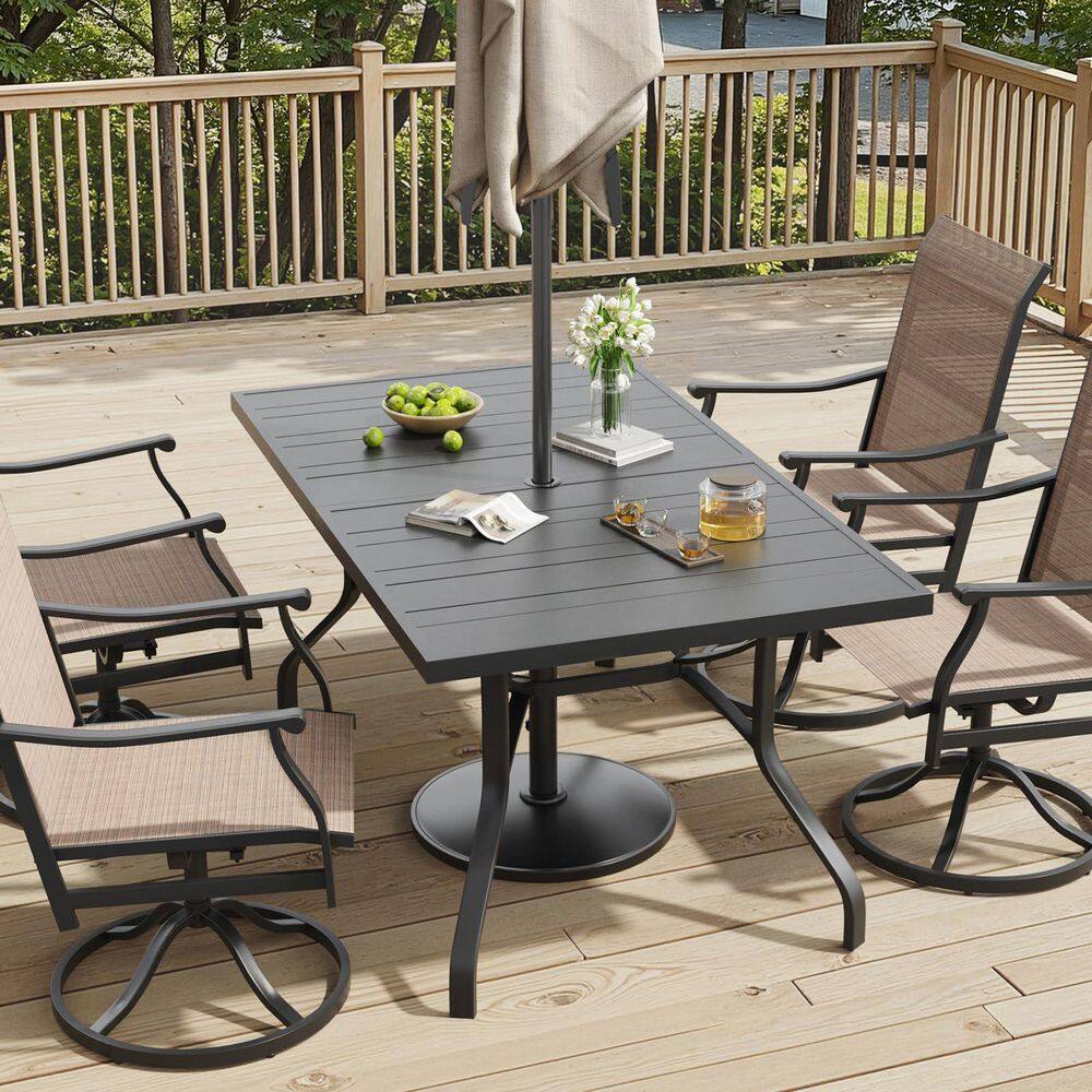 Black rectangular outdoor dining table with a patio umbrella and chairs.