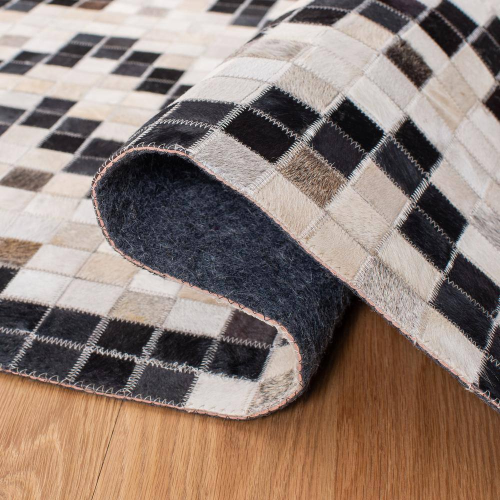Handmade Black and White Geometric Cowhide Rug