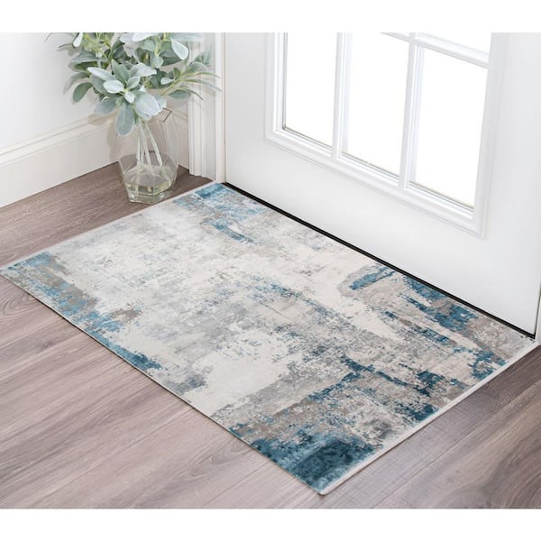 2 ft. x 3 ft. Gray Blue And Ivory Abstract Area Rug With Fringe