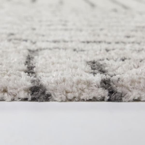 Knowles Cream 5 ft. 3 in. x 7 ft. Striped Area Rug