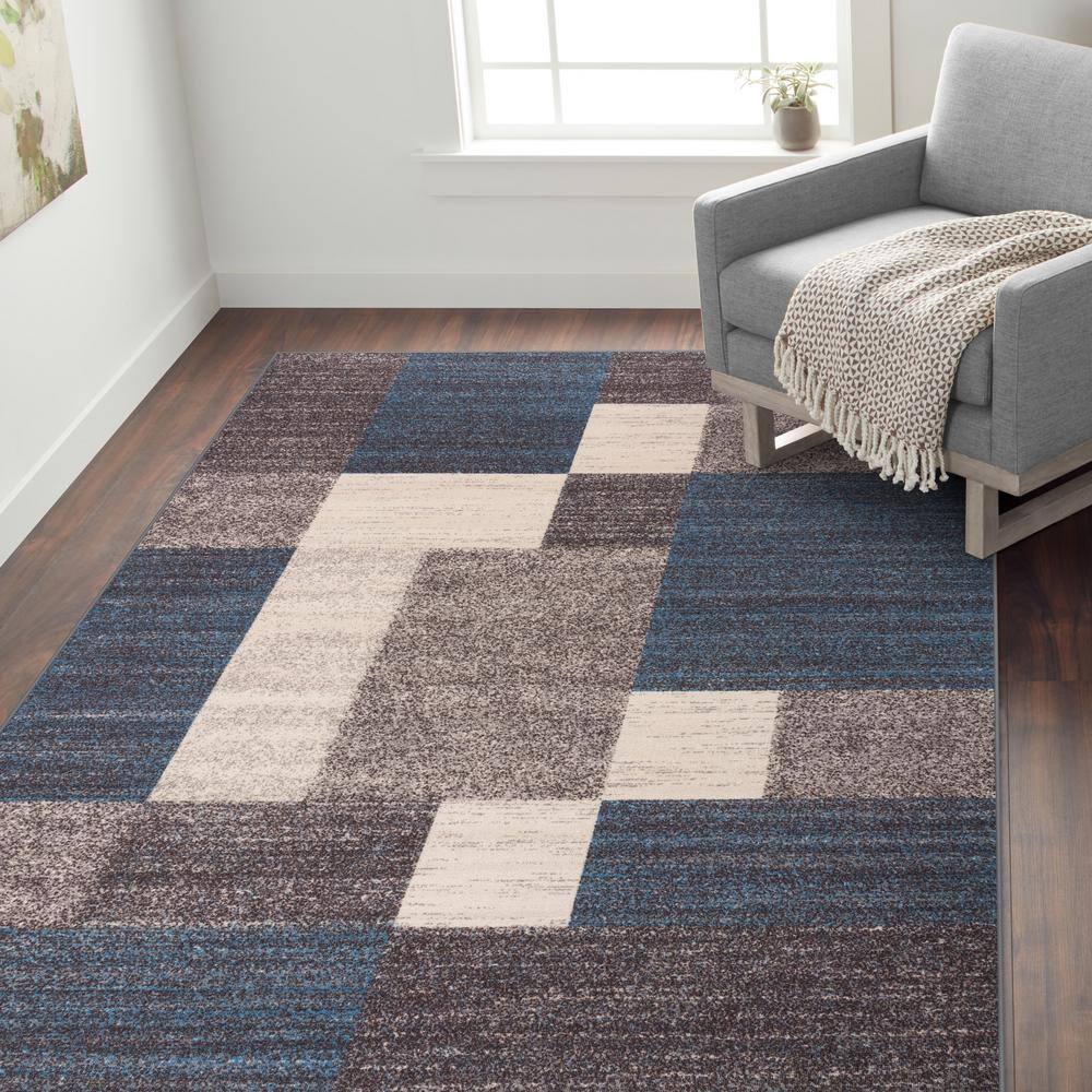 Blue Geometric Tufted Synthetic Rectangular Area Rug 6'6" x 9'