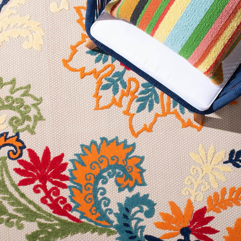 Ivory and Blue Floral Synthetic Indoor/Outdoor Rug