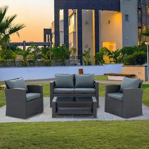 4-Piece Seasonal PE Wicker Outdoor Sectional Set with Coffee Table and Dark Gray Cushions