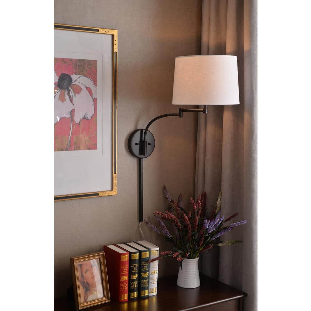 Seven Sleek Oil Rubbed Bronze Swing Arm Wall Lamp with Cream Shade