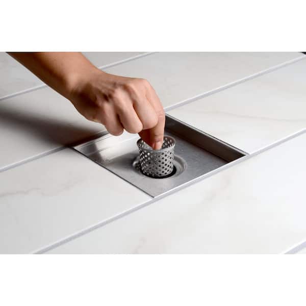 Case Remodeling -- towel hooks in shower, decorative floor drain