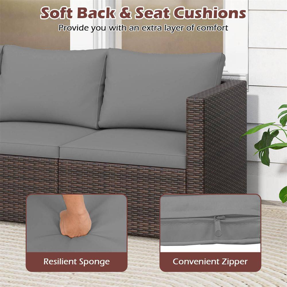 Close-up details of the patio sofa showing the wicker texture, armrest, and foot pads.