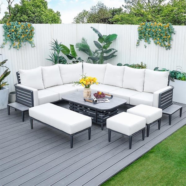 DIRECT WICKER Right Dark Grey 8-Piece Aluminum Patio Conversation Set with Beige Cushions, a Bench and 2 Ottomans