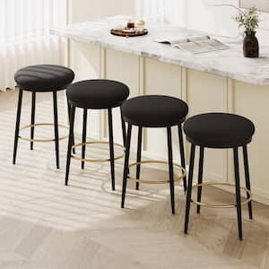 Alvara 24.75 in. Upholstered Metal Counter Stools with Footrest, Black + Gold, (Set of 4)