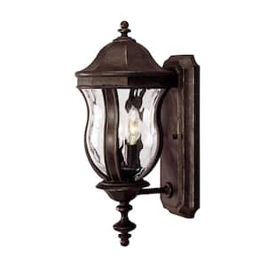 Monticello 7.88 in. W x 17.88 in. H 2-Light Walnut Patina Hardwired Outdoor Wall Sconce with Clear Watered Glass Shade