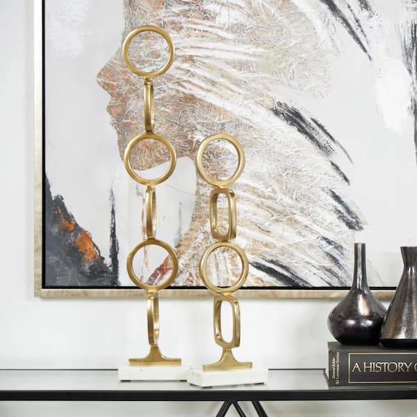 Litton Lane Gold Aluminum Stacked Geometric Rings Abstract Sculpture with White Marble Bases (Set of 2)