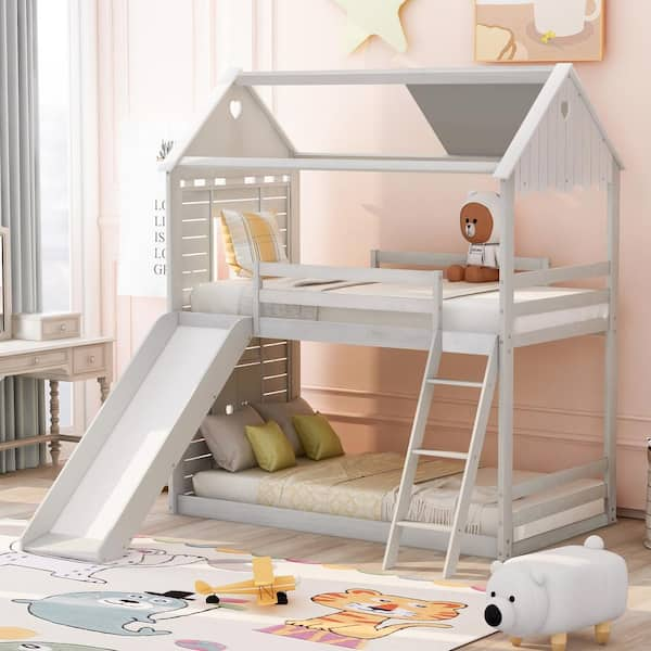 Harper & bright designs twin over twin low bunk bed with clearance slide and ladder white