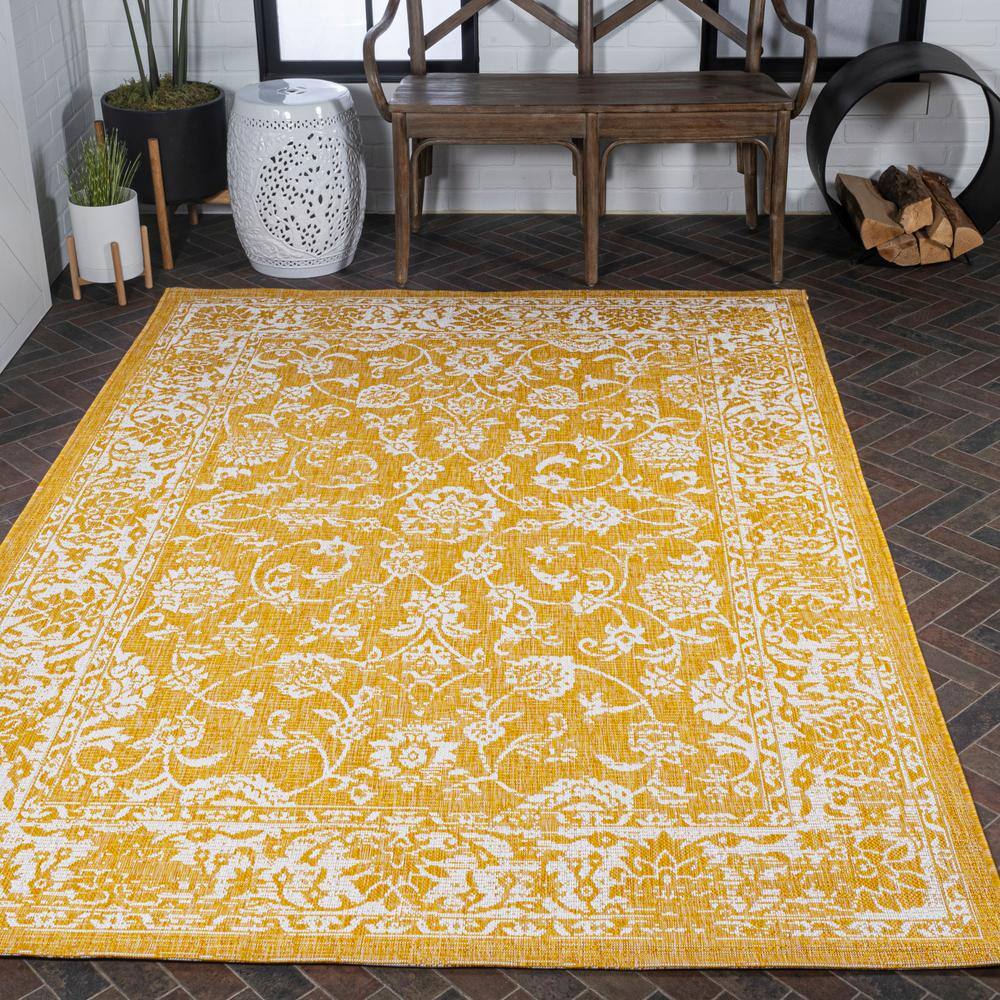 9' x 12' Yellow and Cream Floral Synthetic Rectangular Rug
