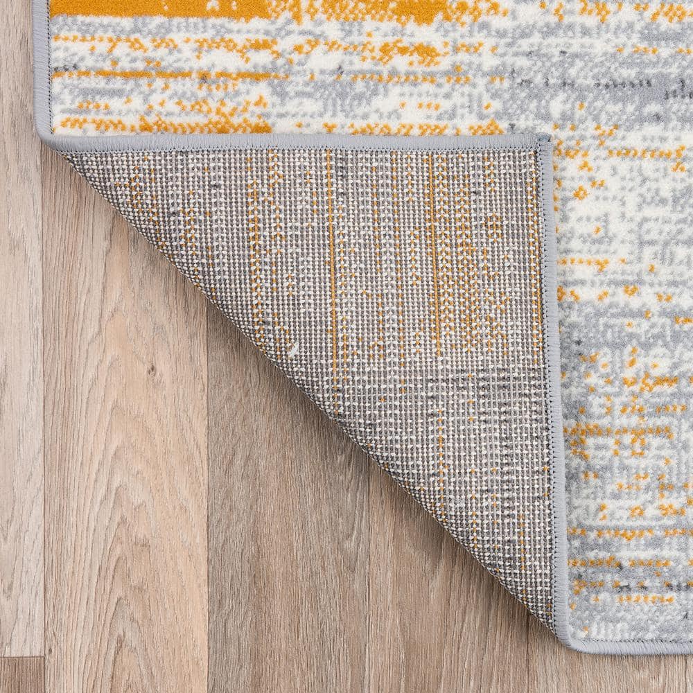 Yellow and Gray Geometric Distressed Area Rug 5' x 7'