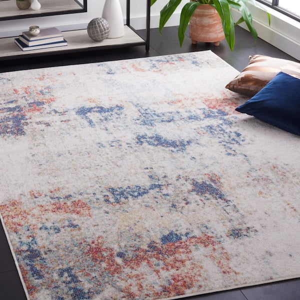 Phoenix 9 ft. x 12 ft. Ivory/Blue Rust Distressed Modern Area Rug