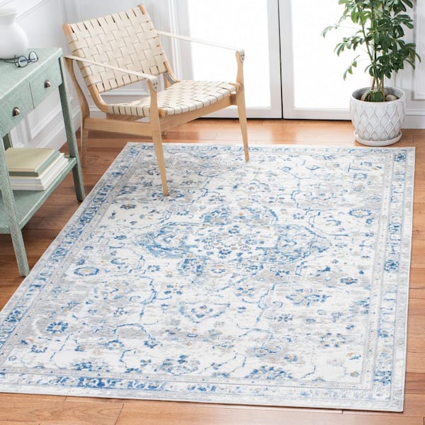 Shivan 4 ft. x 6 ft. Ivory/Blue Distressed Border Medallion Area Rug