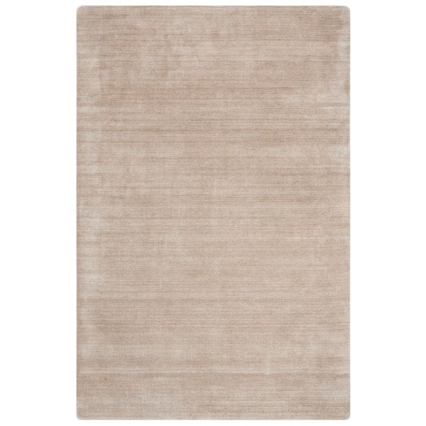 Mirage 6 ft. x 9 ft. Beige Solid Color Distressed Area Rug