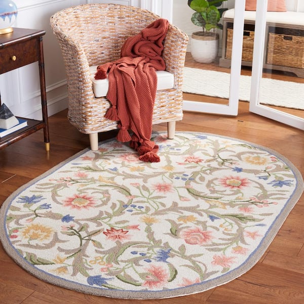 Chelsea Ivory 8 ft. x 10 ft. Oval Floral Border Solid Area Rug