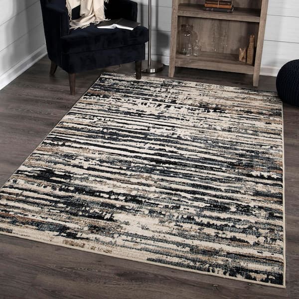 Adagio Tree Tracks 6 ft. 5 in. x 9 ft. 6 in. Indigo Area Rug