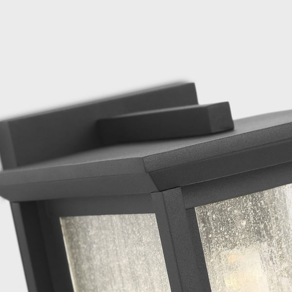 Generation Lighting - Audley 10 in. Textured Black with Distressed Seeded Glass Panels Outdoor Hardwired Lantern Sconce with No Bulbs Included