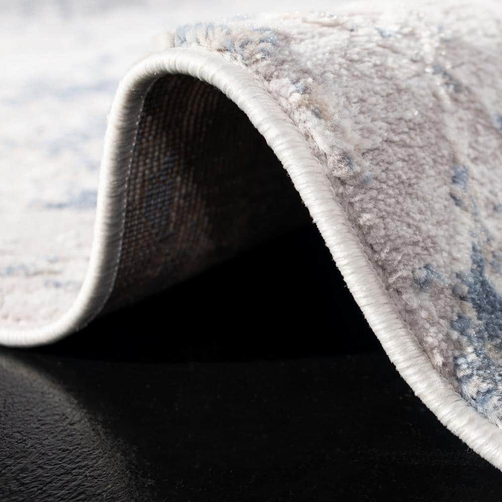 Light Grey and Blue Synthetic 10' x 14' Area Rug