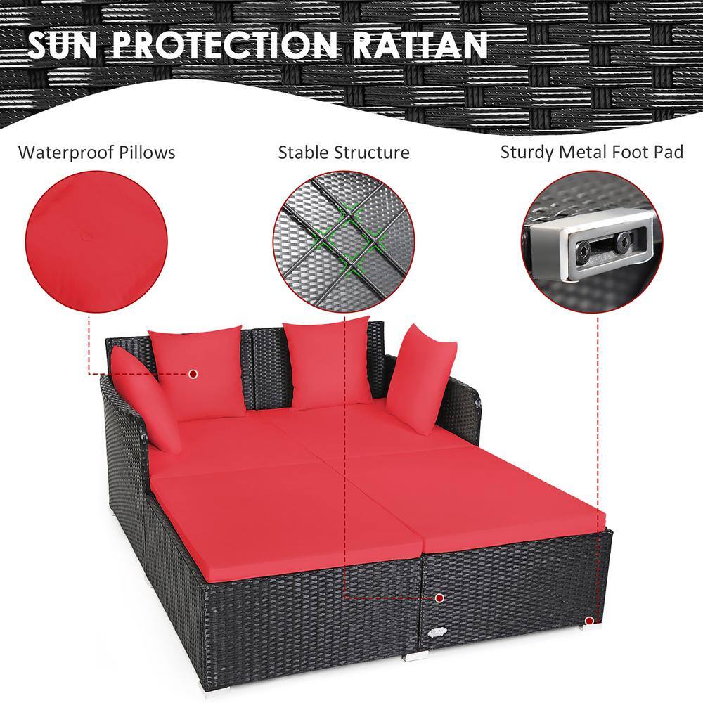 Outdoor Black Rattan Daybed with Red Cushions and Pillows