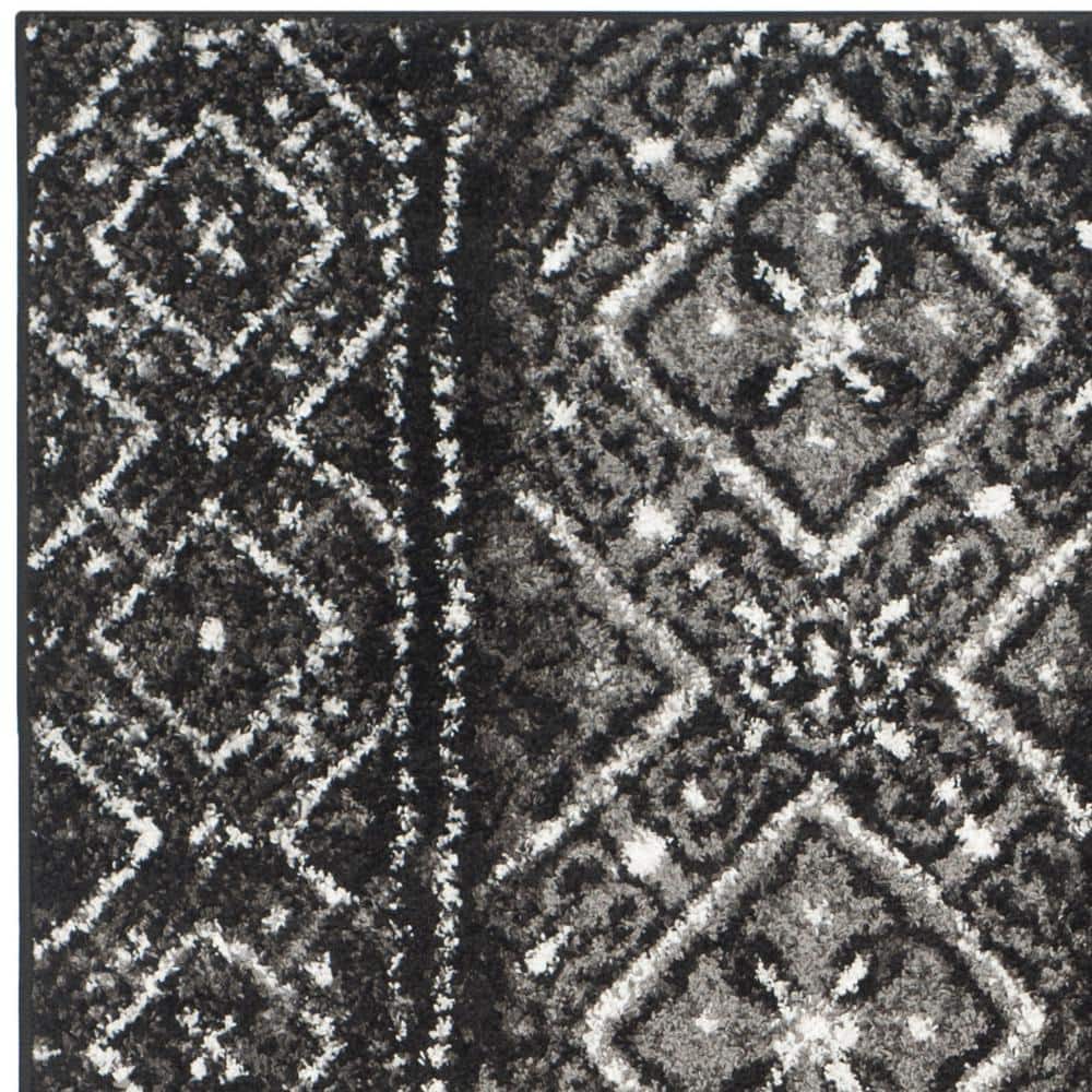Reversible Black/Silver Geometric Synthetic Area Rug 6' x 9'