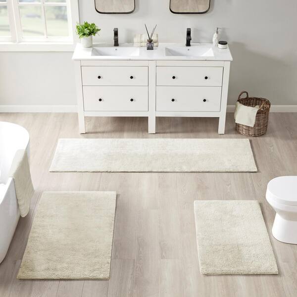 https://images.thdstatic.com/productImages/0f42e9df-f00d-425b-8e71-18f5cc246d86/svn/ivory-beautyrest-bathroom-rugs-bath-mats-br72-3878-fa_600.jpg