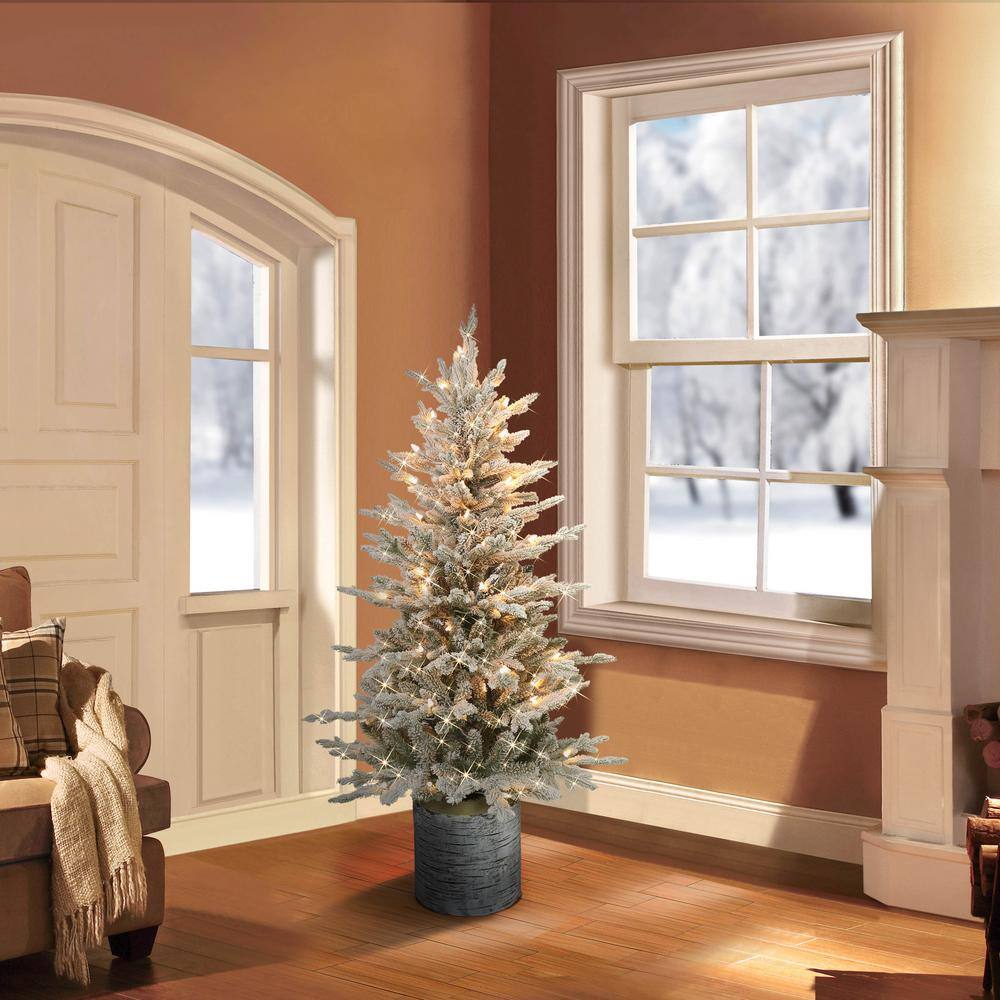 4.5 ft Pre-Lit White Flocked Fir Potted Christmas Tree