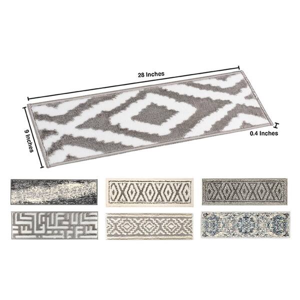 https://images.thdstatic.com/productImages/0f53a3f5-d411-40cc-bc18-ba6f7d96ecdd/svn/gray-the-sofia-rugs-stair-tread-covers-stair-67b-gr-5-e1_600.jpg