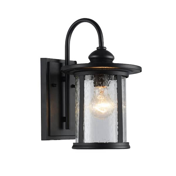 Edvivi Charlton 1-Light Transitional Textured Black Outdoor Wall Lantern Sconce with Clear Seedy Cylinder Glass Shade