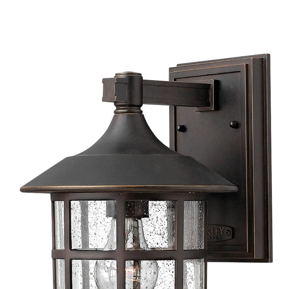 Freeport Classic Bronze Outdoor Wall Sconce with Clear Seedy Glass