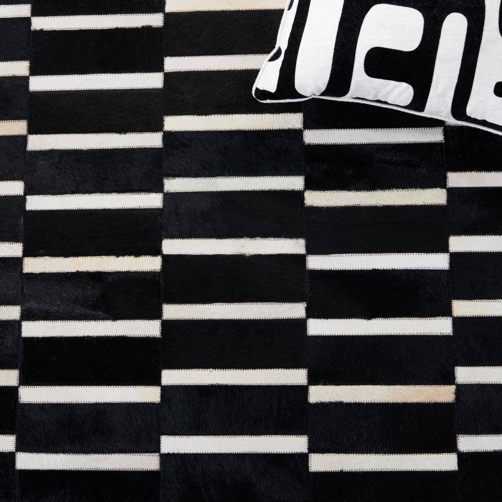 Hand-Knotted Black and Beige Geometric Cowhide Rug